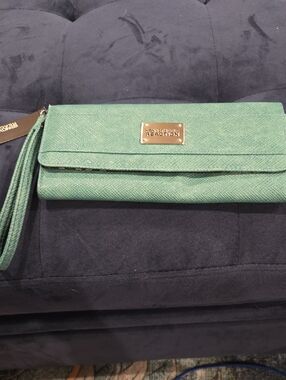 Kenneth Cole Reaction emerald green wristlet clutch with tassel